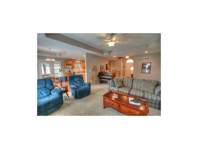 Replace the two blue Lazy Boy chairs with another 