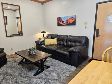 Living Room/Dining Area with sofa bed