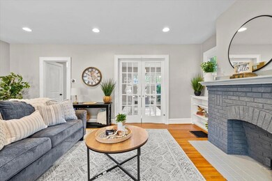 Living room with french doors to DR