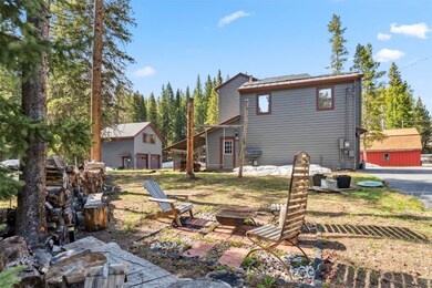 Situated on 0.54 acres, flat lot, featuring a fir
