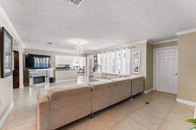 This living room conveniently connects to the dini