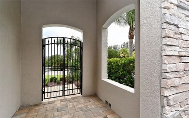 Entrance to this home is through a lovely gated co