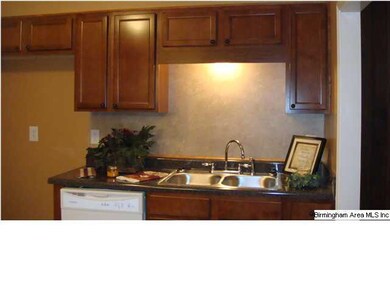The beautiful kitchen has new cabinets, countertop