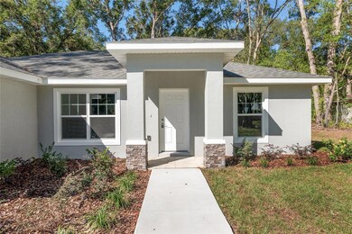 158 E Runic, Citrus Springs, FL 34434 - photo 4