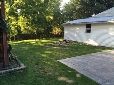 view of partially fenced rear yard