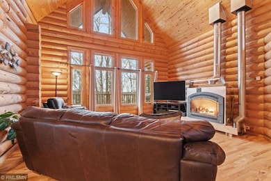 Spacious living room with fireplace perfect for en