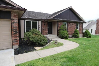 403 N Adams St, Raymore, MO 64083 - photo 2