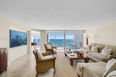 Spacious living room with views of the blue water!