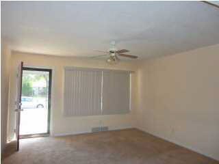 View of living room. Had to keep blinds closed dur