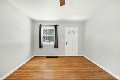 Entryway featuring light wood-style floors and ceiling fan