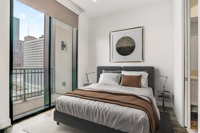 Step into the serene primary bedroom where floor-t