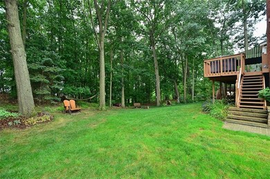 A handy storage shed is artfully concealed under the elevated deck.