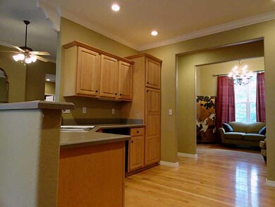 Kitchen. Looking thru Kitchen to the Formal Dining or Den area