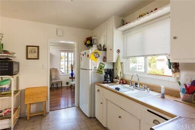 Kitchen with breakfast nook and looking back towar