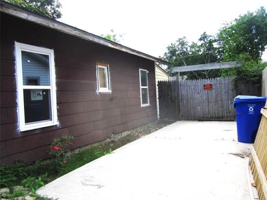View of home's exterior with a patio area and fenc