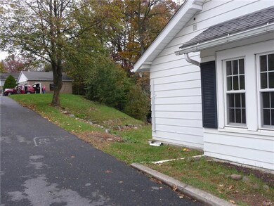 Side view from alley to garage. Most of backyard i