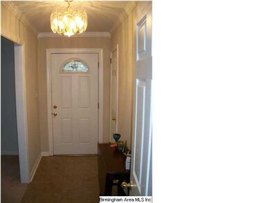 Just inside the front door is a small entry with a
