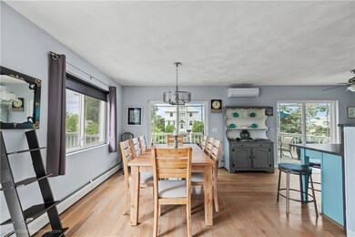 View from Entryway to Dining Area and Kitchen