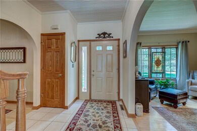 Spacious entry with ceramic tile