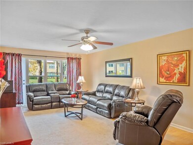 Living area featuring ceiling fan and light wood finished floors
