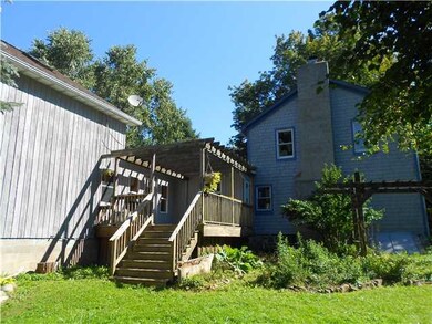 Exterior Front Side porch with gardens