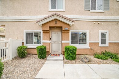 Doorway to property featuring stucco siding