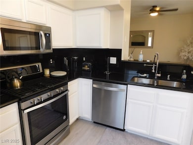 Kitchen with appliances with stainless steel finis