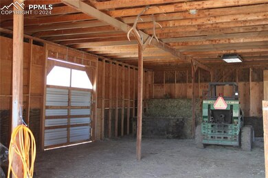 Inside the spacious horse stables.