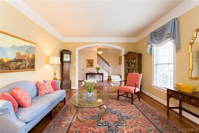 View of lovely formal living room and foyer with f