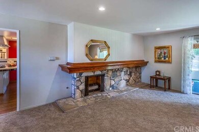 The living room also features a gorgeous stone, ga