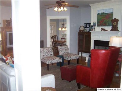 THE FAMILY ROOM IS VERY INVITING FROM THE FIRST ST