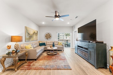 Spacious open-concept living area with abundant na