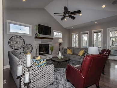 Vaulted Cathedral Ceilings and Beautiful Fireplace