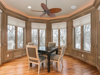 Charming octagonal Sun Room with rich walnut panel