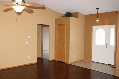 Tiled entry and closets.