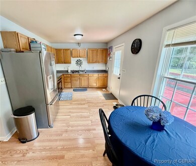 Kitchen featuring stainless steel refrigerator, LV