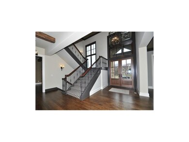 Grand 2 story entry. Mirror feature above transom 