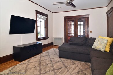 Living room--view facing the street, French doors