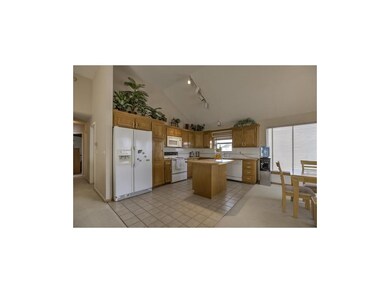 Breakfast bar at kitchen island perfect for grabbi