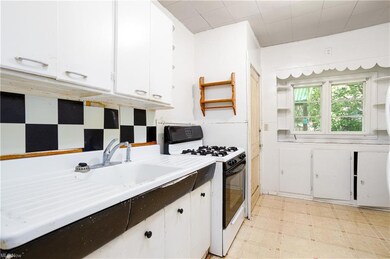 Kitchen featuring light countertops