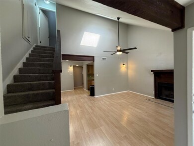 Unfurnished living room with light wood-type floo