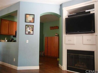 Fireplace located within Living room. 
