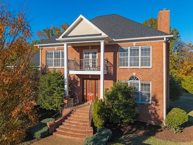 Clean, crisp curb appeal at this stately all brick home.