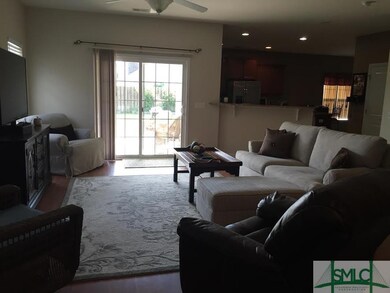 Updated photo of living room. Neutral paint