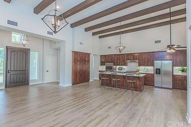 Expansive  great  room  with  open  beam  ceilings