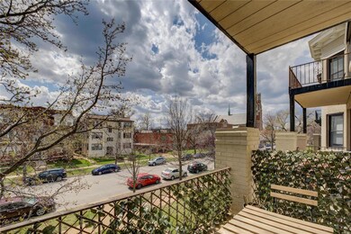 The street view from the covered balcony