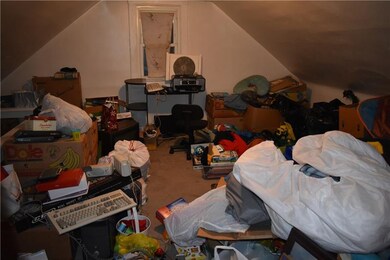 Room in the attic that could be used as a third be
