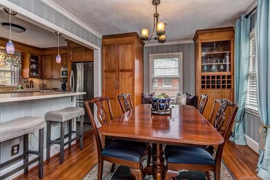 Formal dining room could also be a hang out room. 