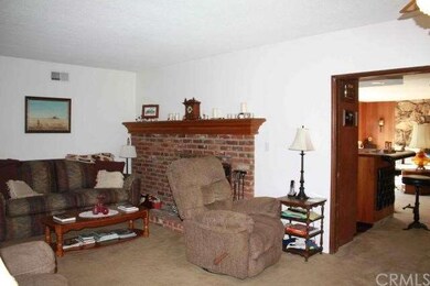 Living room. Great room/den through double pocket 
