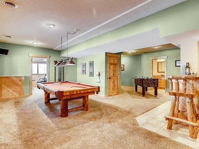 Spacious lower level includes game/activity room